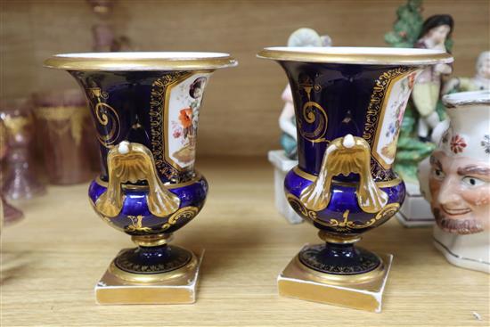 A small group of ceramics, including a pair of Derby style cobalt blue campana urns